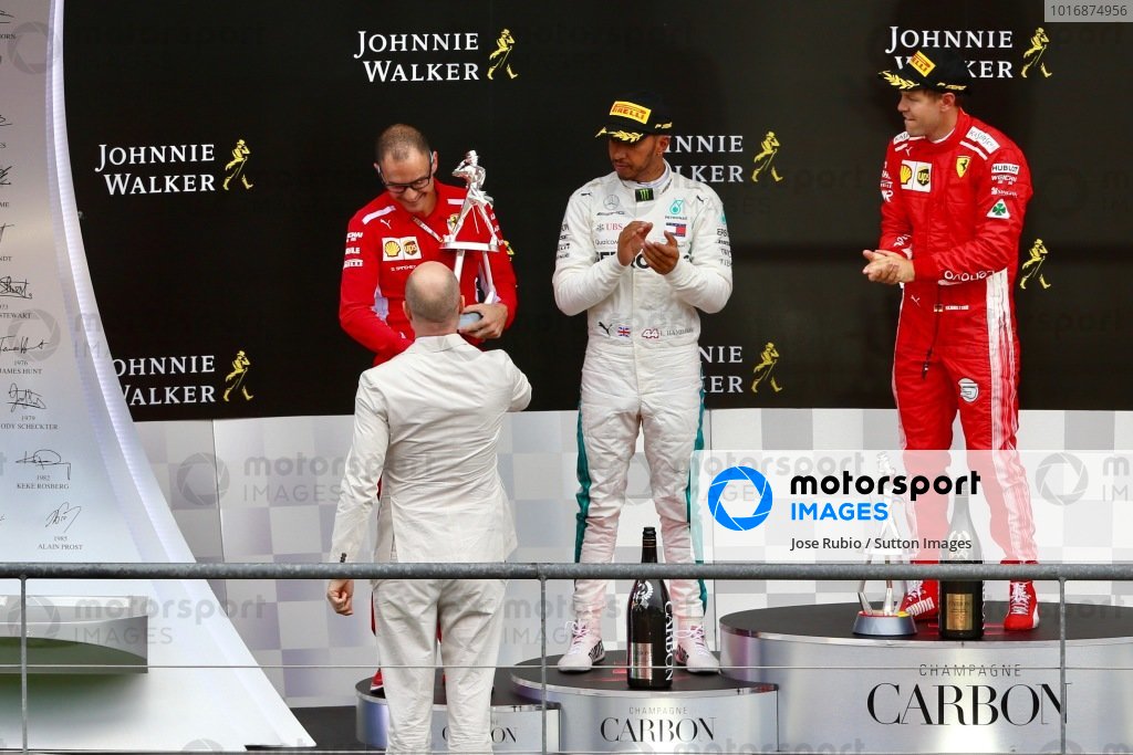 David Sanchez, Ferrari receives the constructor trophy on the podium from  John Williams, Johnnie Walker, Lewis Hamilton, Mercedes AMG F1 and  Sebastian Vettel, Ferrari, Belgian GP